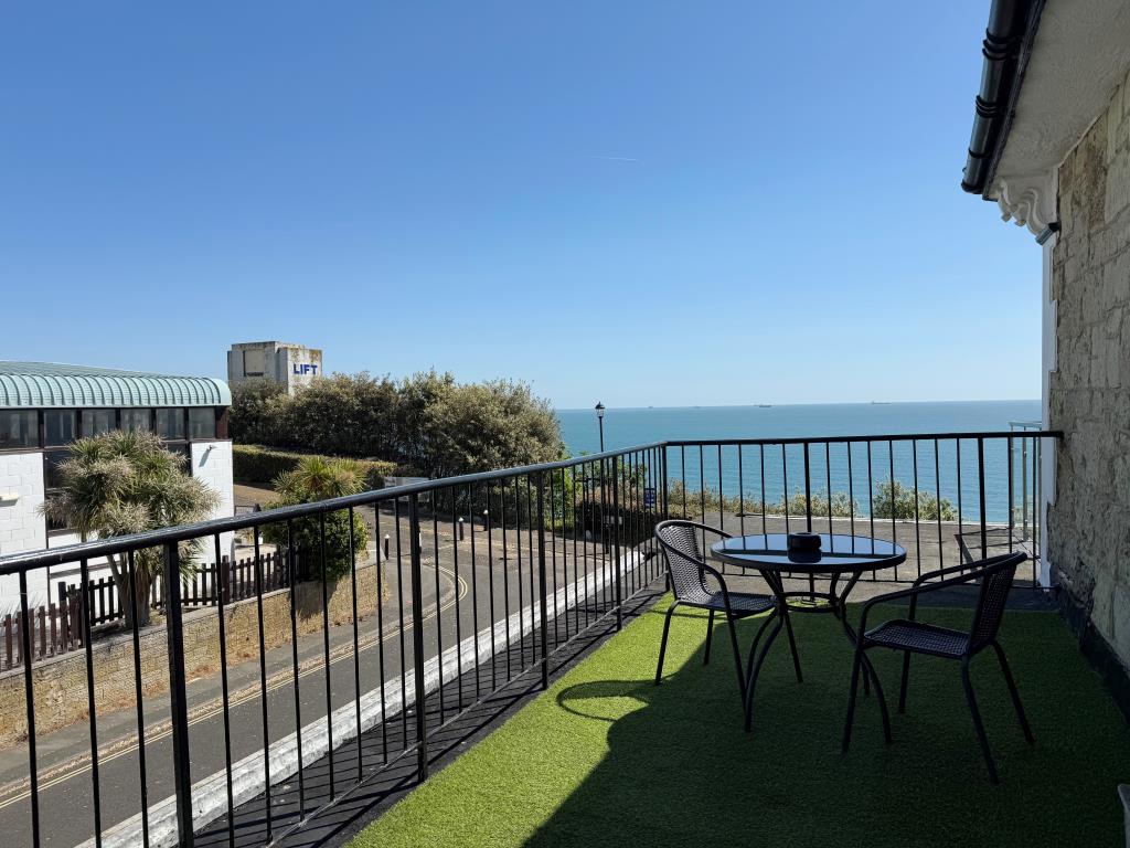 Lot: 48 - FREEHOLD CLIFF TOP HOTEL WITH TWENTY EN-SUITE GUEST ROOMS AND STUNNING VIEWS - A Photograph from the Balcony of a Side Bedroom